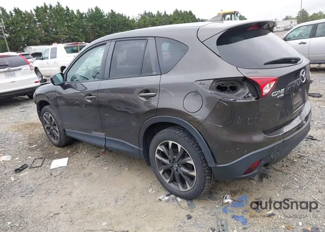 2016 Mazda Cx-5 Grand Touring z USA, uszkodzony, nr VIN JM3KE4DY1G0740045